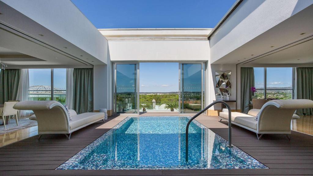 https://golftravelpeople.agiledigitalsolutions.co.uk/wp-content/uploads/2019/04/Conrad-Algarve-Hotel-Bedrooms-and-Suites-9.jpg