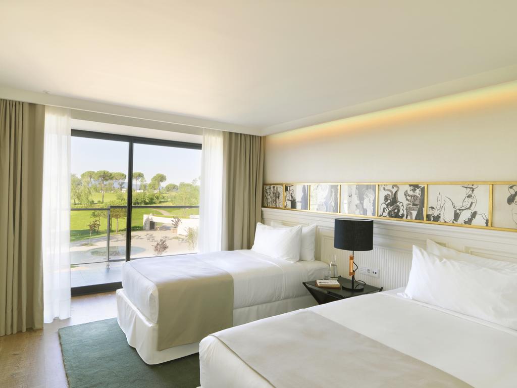 https://golftravelpeople.agiledigitalsolutions.co.uk/wp-content/uploads/2019/04/Hotel-Camiral-at-PGA-Catalunya-Resort-Bedrooms-6.jpg
