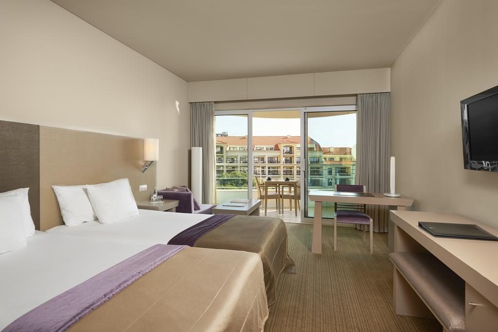 https://golftravelpeople.agiledigitalsolutions.co.uk/wp-content/uploads/2019/04/Melia-Madeira-Mare-Funchal-Bedrooms-13-1024x683.jpg