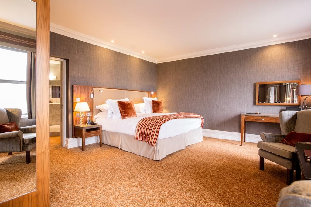 https://golftravelpeople.agiledigitalsolutions.co.uk/wp-content/uploads/2019/07/Slieve-Donard-Hotel-Newcastle-County-Down-Northern-Ireland-Bedrooms-16-1024x683.jpg