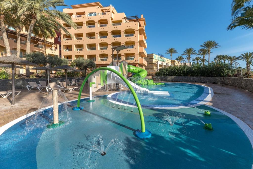 https://golftravelpeople.agiledigitalsolutions.co.uk/wp-content/uploads/2020/11/Elba-Sara-Beach-Golf-Resort-Fuerteventura-Swimming-Pools-and-Leisure-Facilities-7.jpg