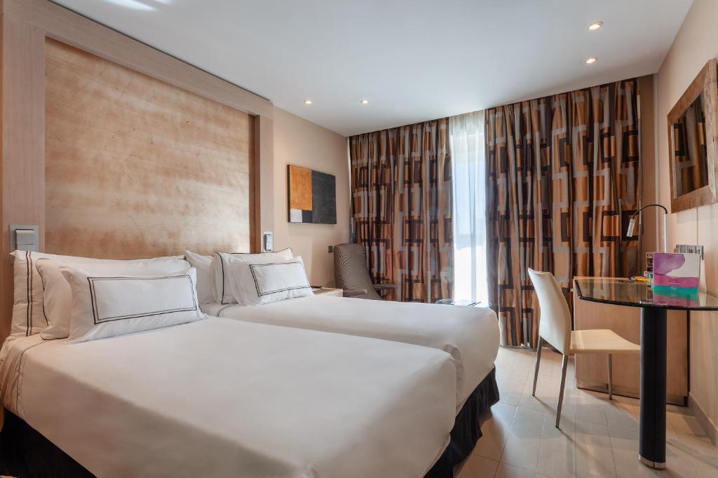 https://golftravelpeople.agiledigitalsolutions.co.uk/wp-content/uploads/2021/07/Hotel-Melia-Seville-Seville-Bedrooms-28.jpg
