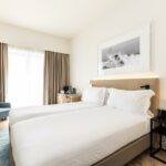 https://golftravelpeople.agiledigitalsolutions.co.uk/wp-content/uploads/2024/10/Crowne-Plaza-Caparica-Lisbon-Hotel-Bedrooms-Suites-and-Apartments-5-150x150.jpg